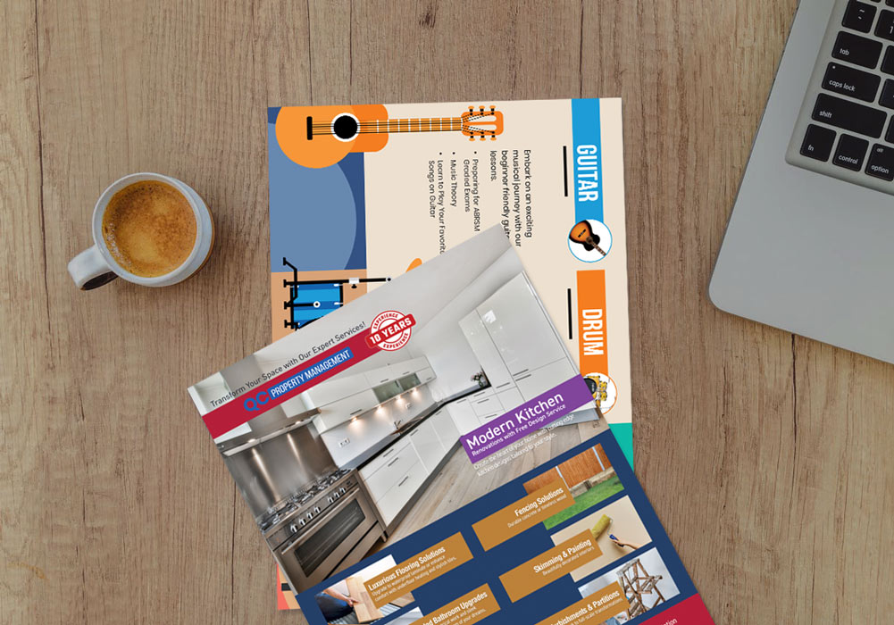 print materials printed-leaflet-on-wooden-desk